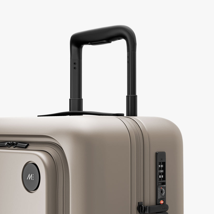 Desert Taupe | Luggage handle view of Carry-On Pro Plus in Desert Taupe