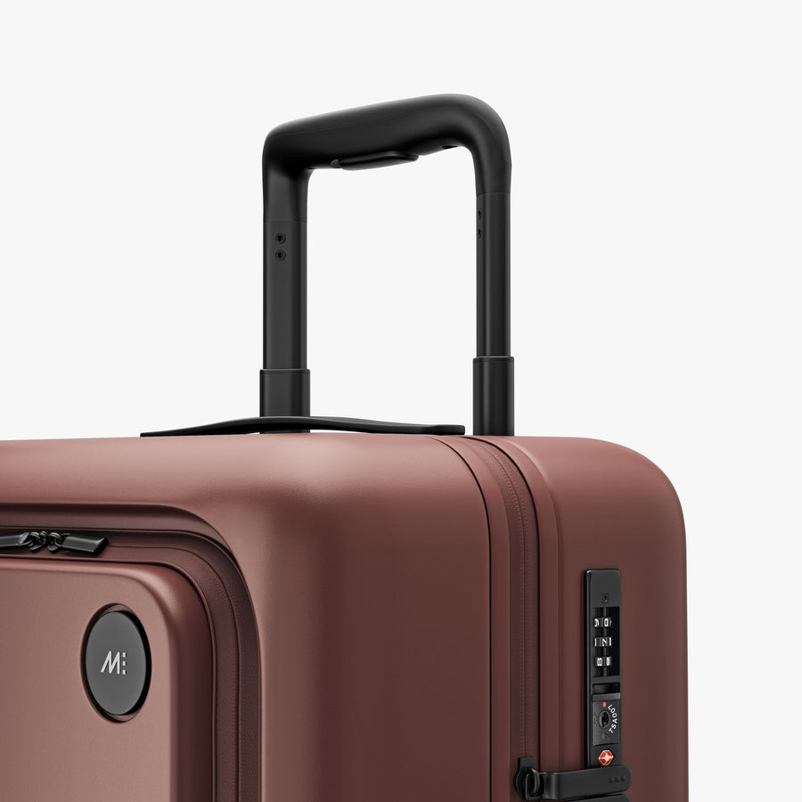 Terracotta | Luggage handle view of Carry-On Pro Plus in Terracotta