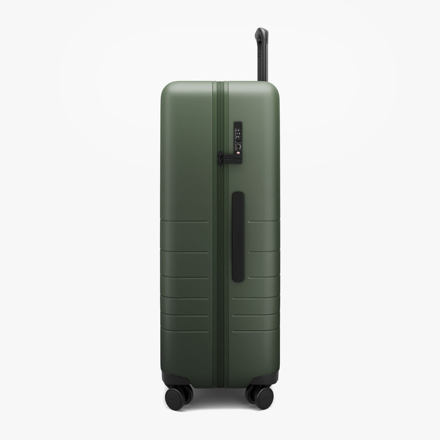 Olive Green | Side view of Check-In Large in Olive Green