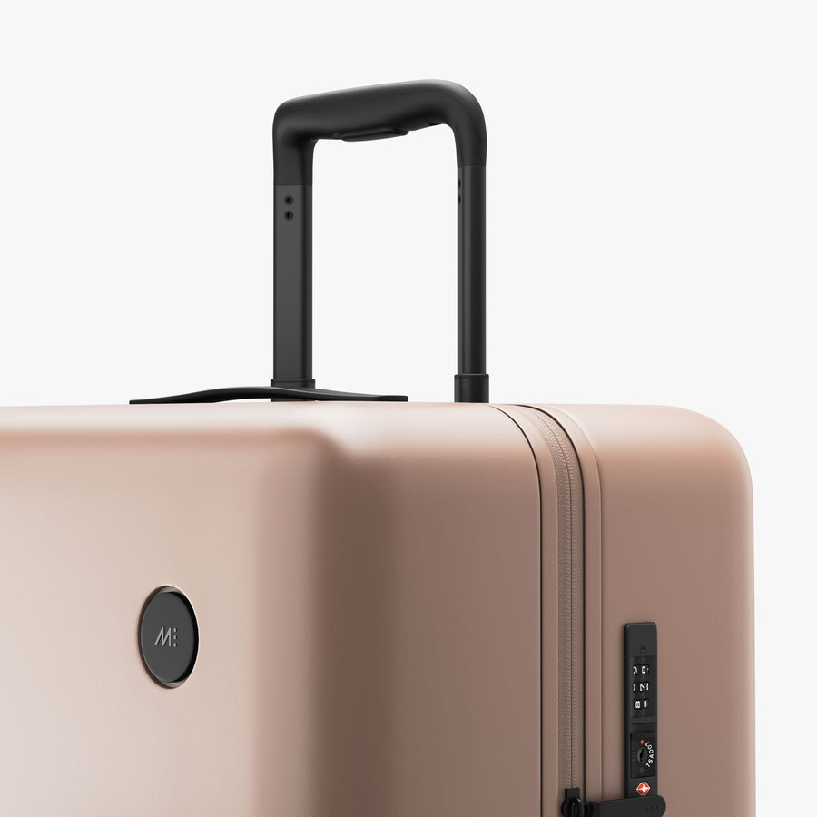 Rose Quartz | Luggage handle view of Check-In Large in Rose Quartz