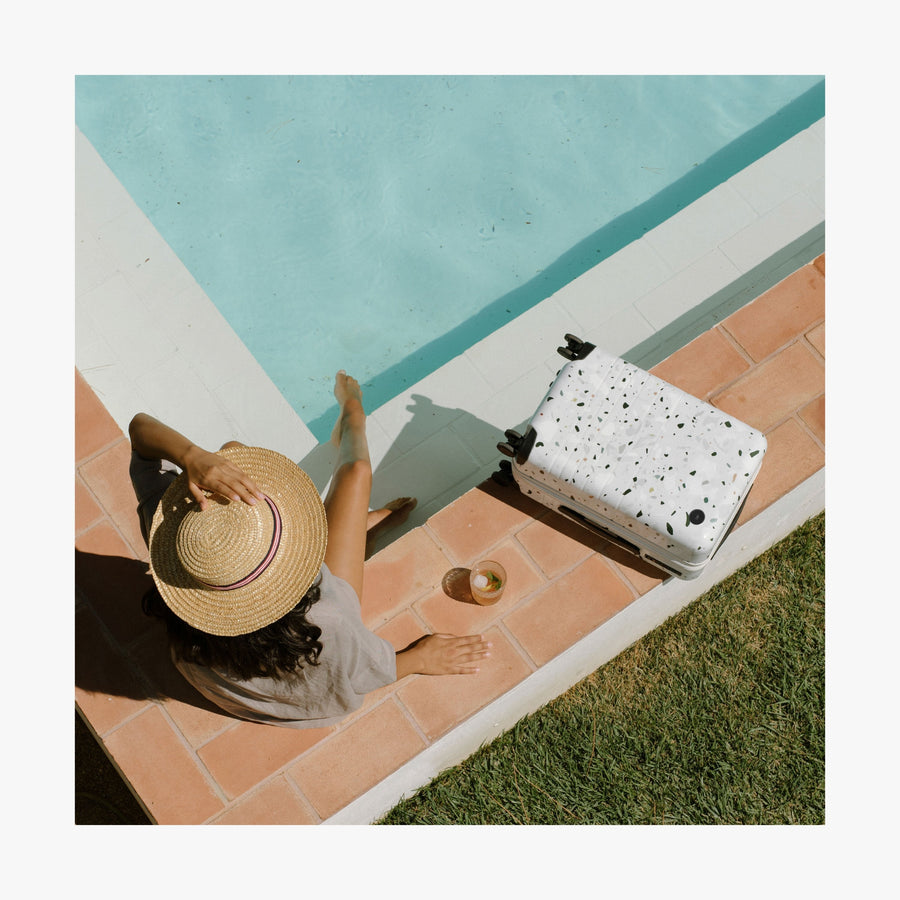 Terrazzo | this is a photo of the Terrazzo Carry-On beside a pool