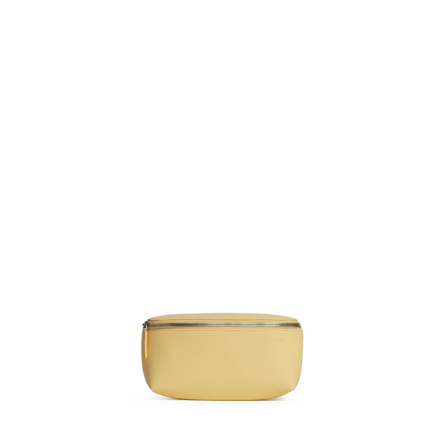 Banana Pudding (Vegan Leather) Scaled | Front view of Metro Sling in Banana Pudding