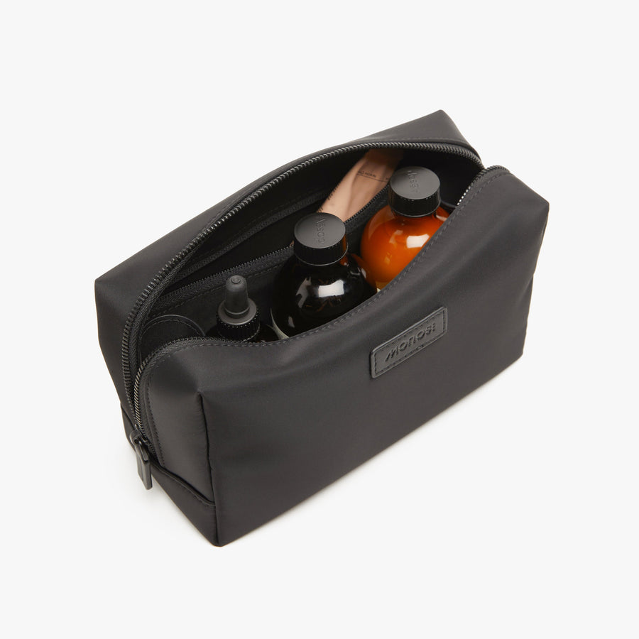 Large / Carbon Black | Interior front view of Metro Toiletry Case Large in Carbon Black