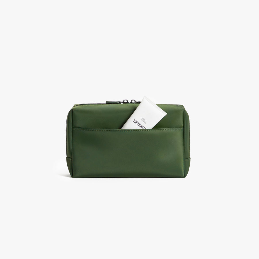 Large / Juniper Green | Back view showing pocket of Metro Toiletry Case Large in Juniper Green
