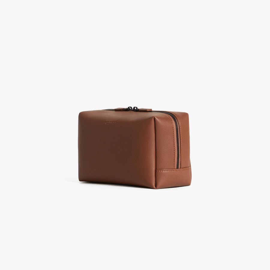 Large / Mahogany (Vegan Leather) | Angled view of Metro Toiletry Case Large in Mahogany