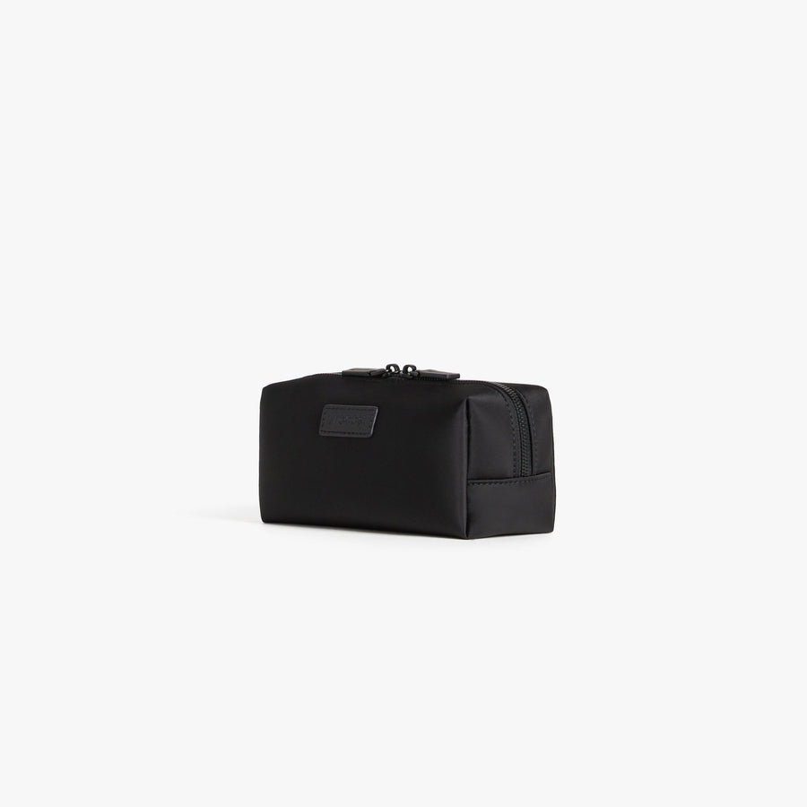 Small / Carbon Black | Angled view of Metro Toiletry Case Small in Carbon Black