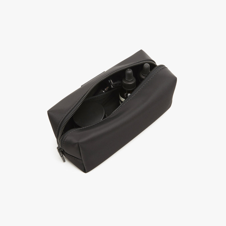 Small / Carbon Black | Interior back view of Metro Toiletry Case Small in Carbon Black