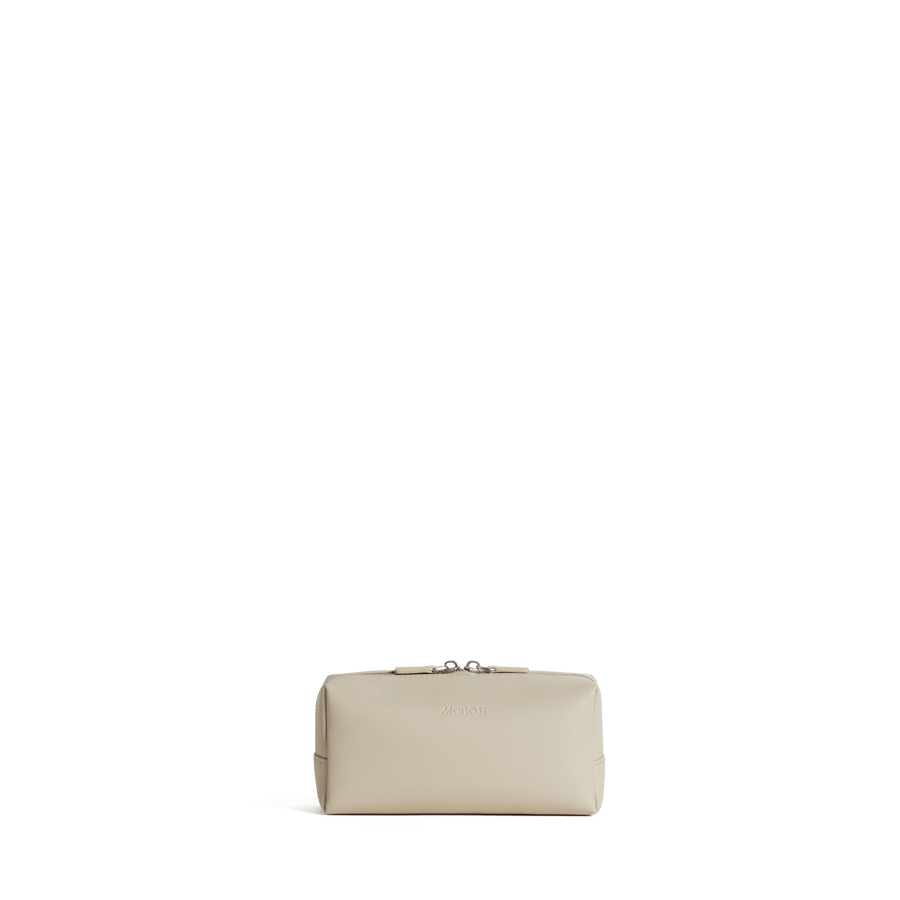 Small / Ivory (Vegan Leather) Scaled | Front view of Metro Toiletry Case Small in Ivory