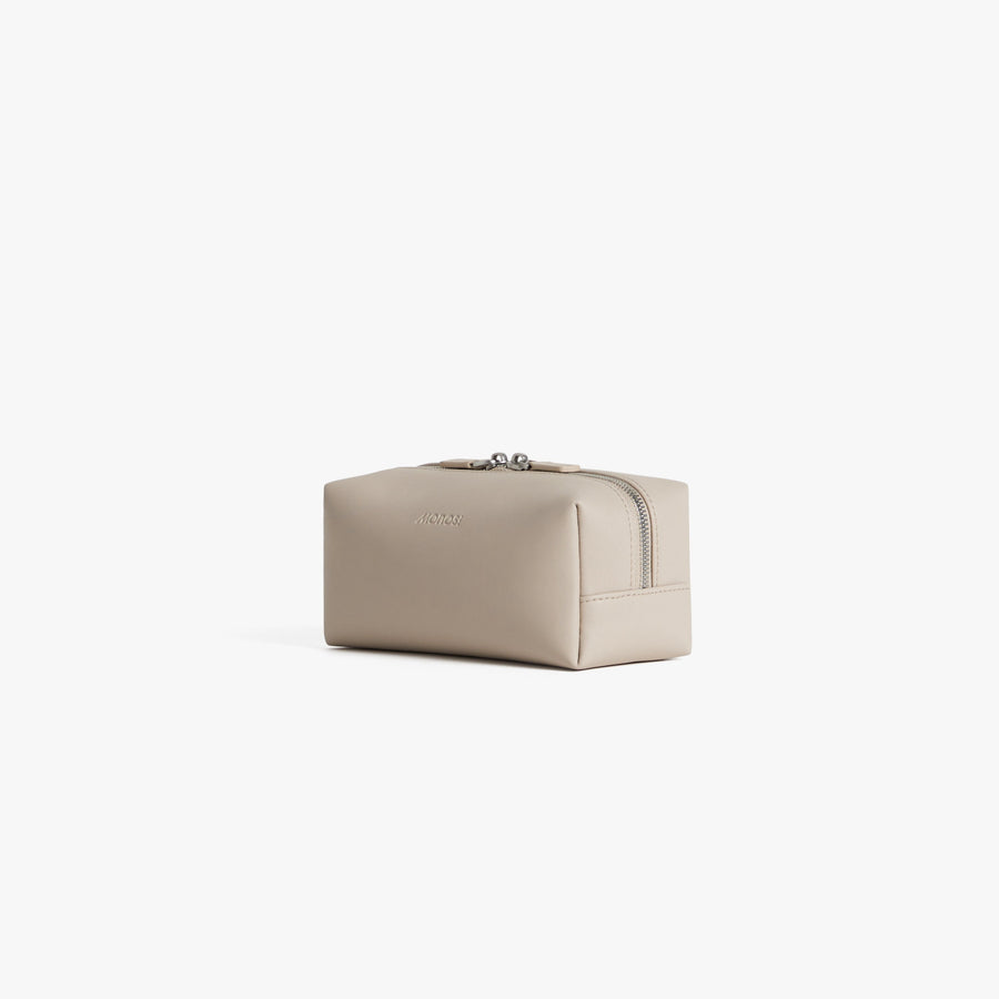 Small / Ivory (Vegan Leather) | Angled view of Metro Toiletry Case Small in Ivory
