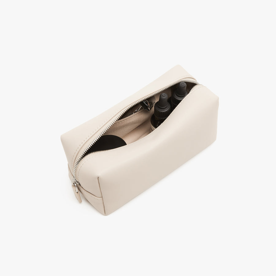 Small / Ivory | Interior back view of Metro Toiletry Case Small in Ivory